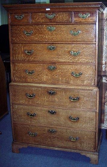 Appraisal: A late th Century oak tallboy the dentil cornice above