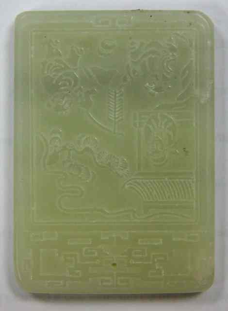 Appraisal: A jade tablet carved with a landscape to one side