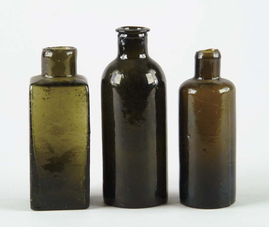 Appraisal: LOT OF THREE SMALL GREEN BOTTLES All with pontils Two