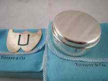 Appraisal: A Tiffany silver circular jewellery box together with a Tiffany