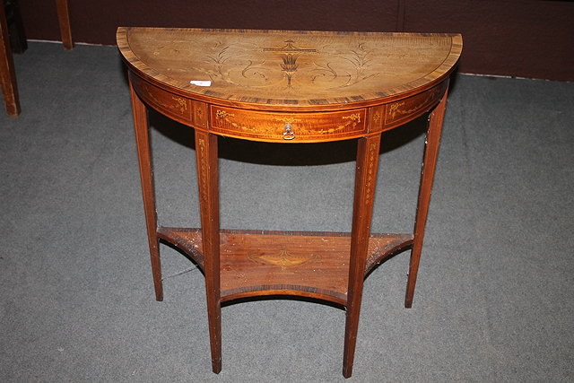 Appraisal: AN EDWARDIAN SHERATON REVIVAL MAHOGANY AND INLAID DEMI-LUNE SIDE TABLE