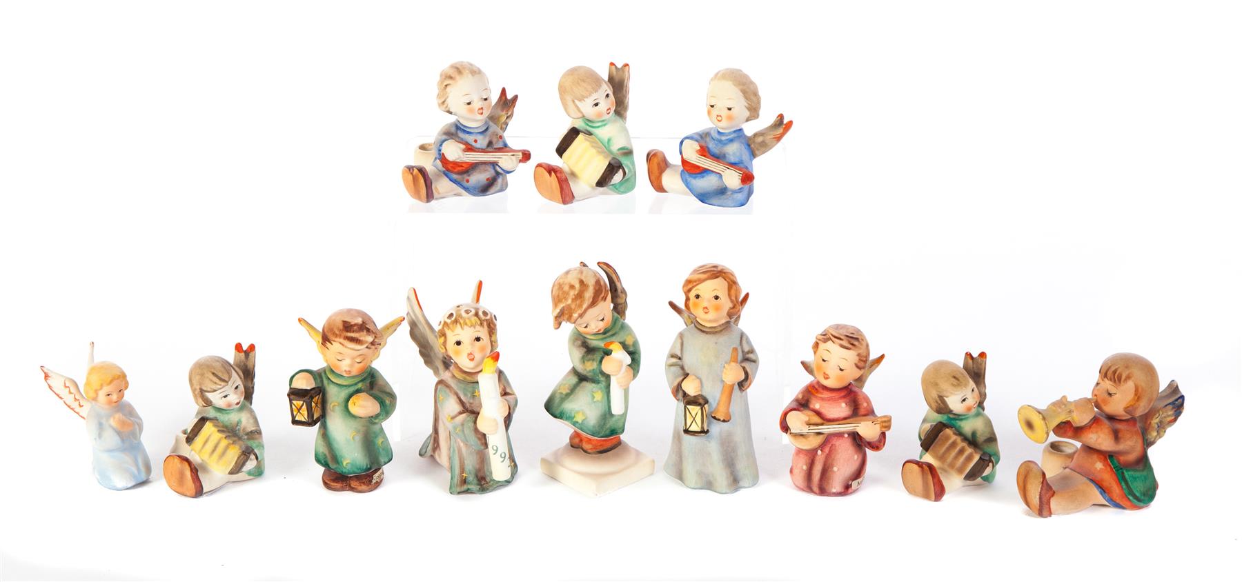 Appraisal: GROUP OF TWELVE HUMMEL FIGURINES OF ANGELS Germany th century