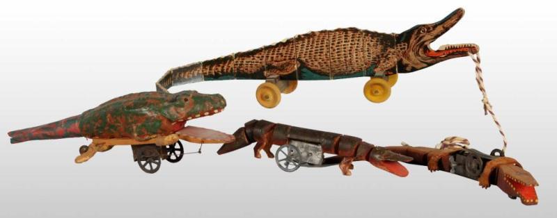 Appraisal: Lot of Early Alligator Toys Description German and American The