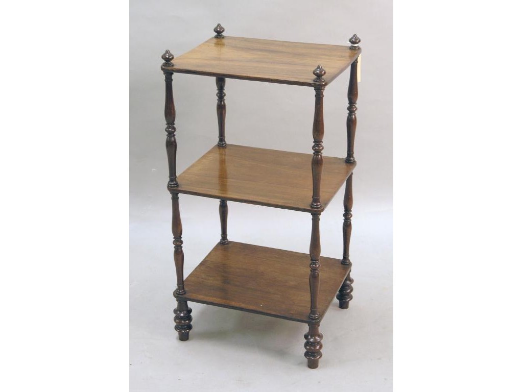 Appraisal: A mid-Victorian rosewood whatnot three tiers supported upon turned columns