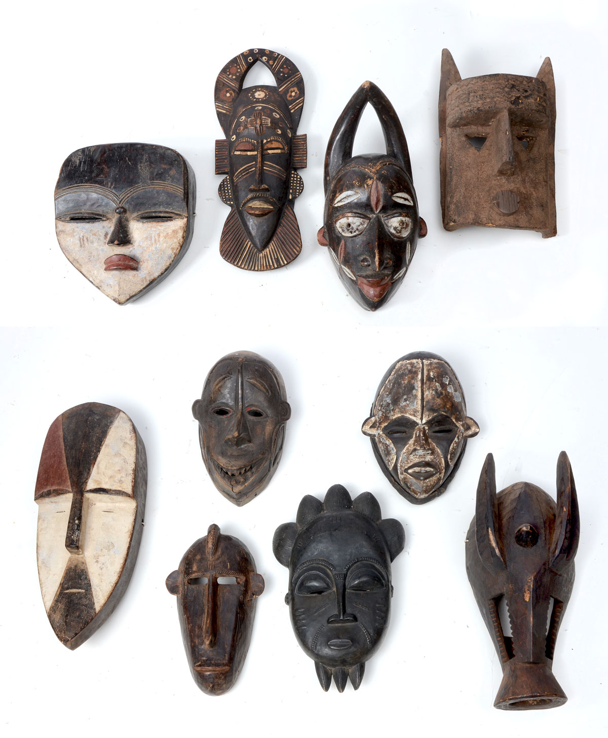 Appraisal: PC AFRICAN CARVED MASK COLLECTION hand carved African masks mainly