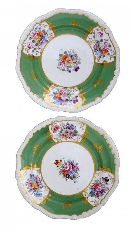 Appraisal: A PAIR OF ROCKINGHAM DINNER PLATES of gadroon with acanthus