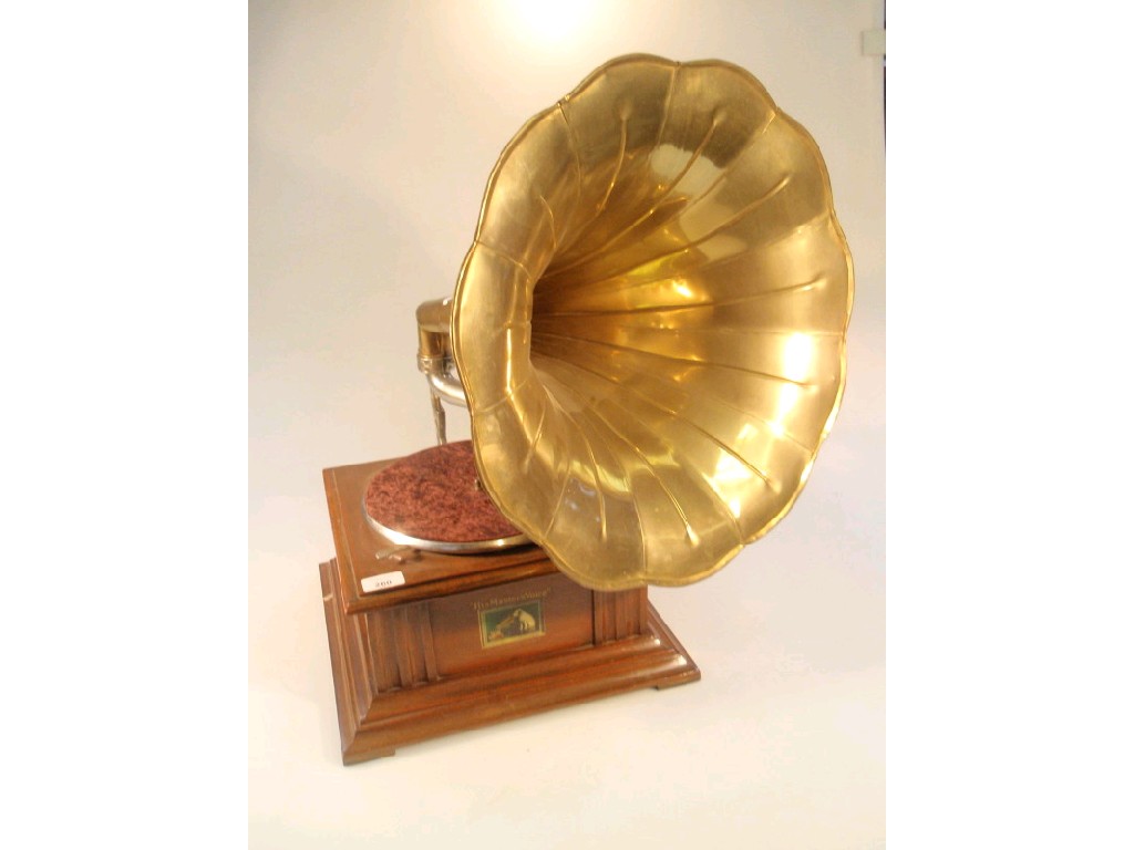 Appraisal: A table top gramophone with brass horn and HMV label