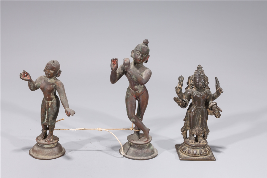 Appraisal: Three small Indian bronze statues on bases wear losses to