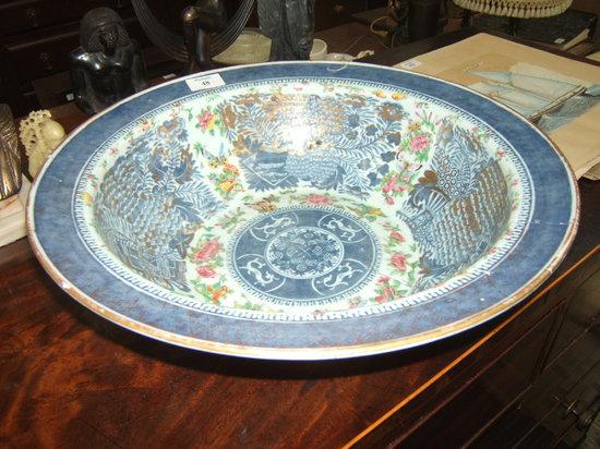 Appraisal: A large Chinese wash bowl damages wide