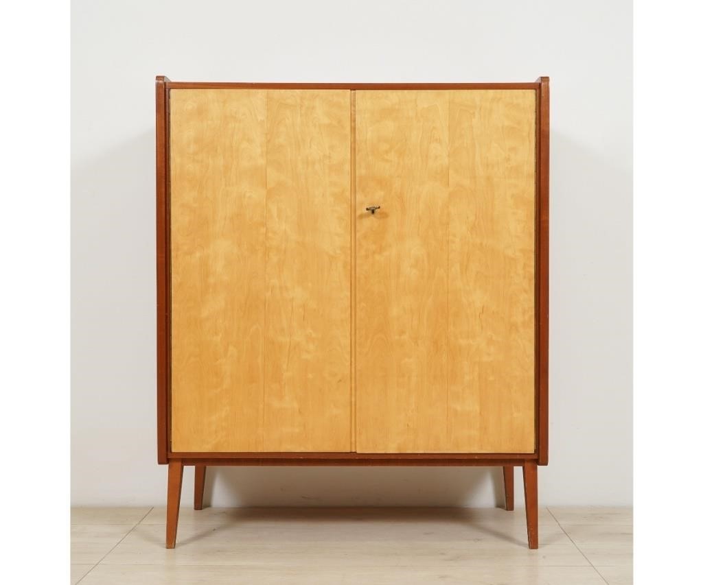 Appraisal: Mid-century modern teak cabinet with blonde wood doors h x