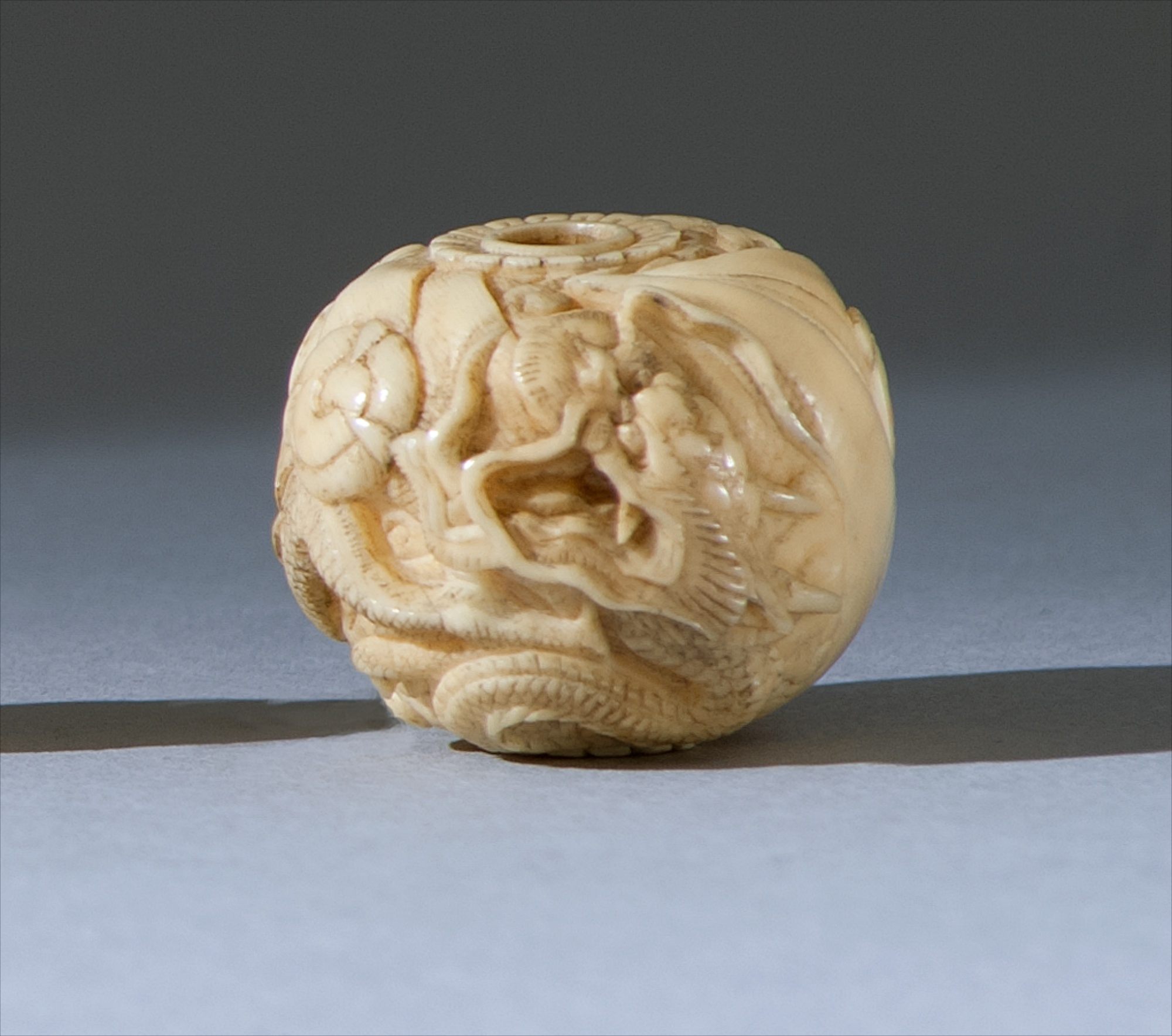 Appraisal: IVORY OJIME Meiji PeriodBy Tomomasa In ball form depicting a