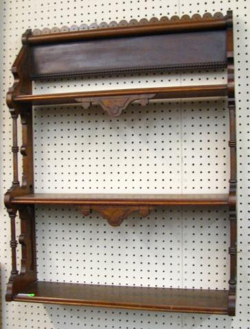 Appraisal: Eastlake Style Wall Shelf walnut with burl veneer '' high