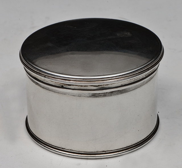 Appraisal: A PLAIN CONTINENTAL SILVER FREEDOM BOX with engraved crest to