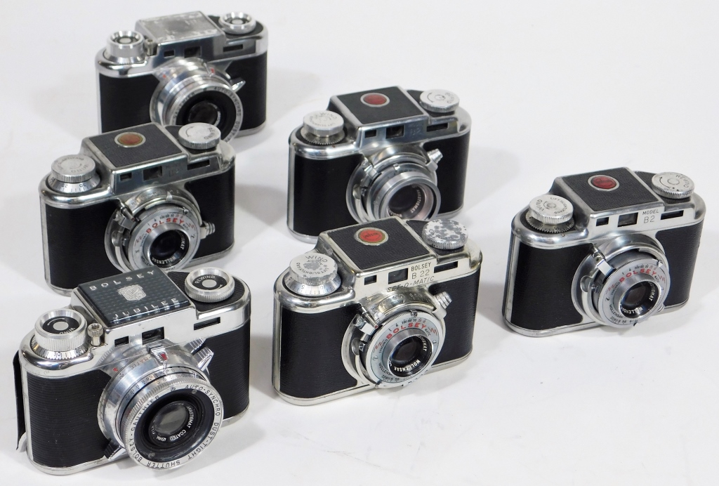 Appraisal: GROUP OF BOLSEY CAMERAS Group of Bolsey cameras circa Includes