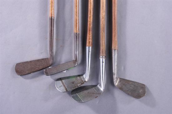 Appraisal: FIVE GOLF CLUBS INCLUDING SPALDING HB PUTTER Putter is hollow