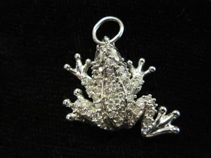 Appraisal: White gold frog pendantEncrusted with approximately sixty petite round cut