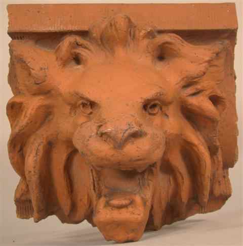 Appraisal: TERRA COTTA ARCHITECTURAL ELEMENT cast as a snarling lion's mask