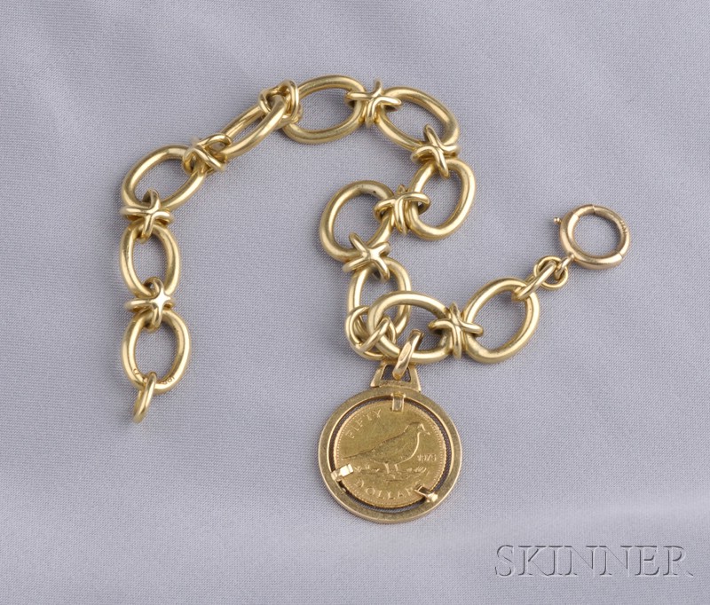 Appraisal: kt Gold Bracelet composed of fancy oval links suspending a