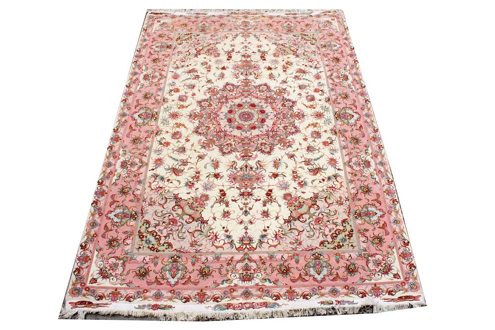 Appraisal: Persian Pink Floral Carpet ' x ' Persian pink floral