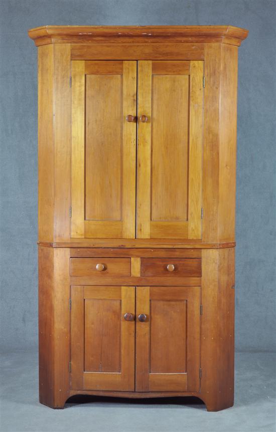 Appraisal: Cherry Corner Cupboard Circa Two piece construction Ogee cornice above