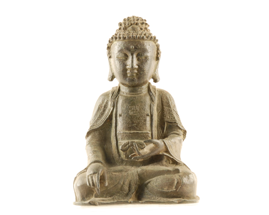 Appraisal: An Early Tibetan Seated Buddha of patinaed cast metal possibly