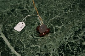 Appraisal: A carved melon an leaf in brown and grey agate