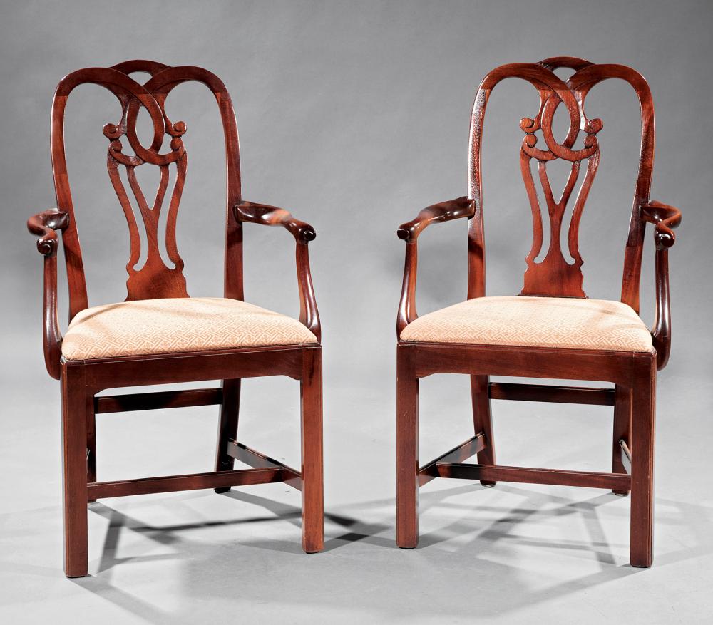 Appraisal: Pair of Georgian-Style Carved Mahogany Armchairs arched crest intertwined splat