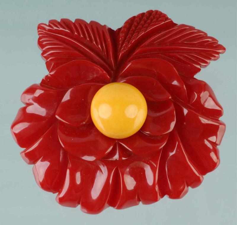 Appraisal: Bakelite Maroon Floral Pin with Cream Center Description CORRECTION Pin