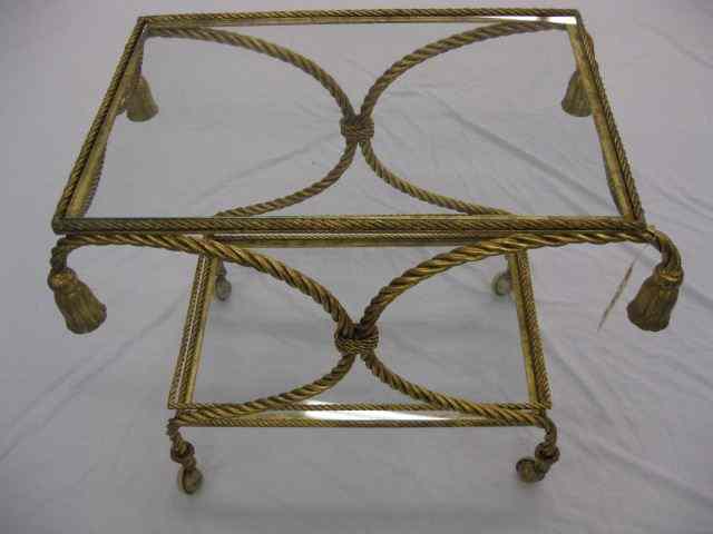 Appraisal: Italian Gilt Metalwork Tea Cart rope tassel decor glass top