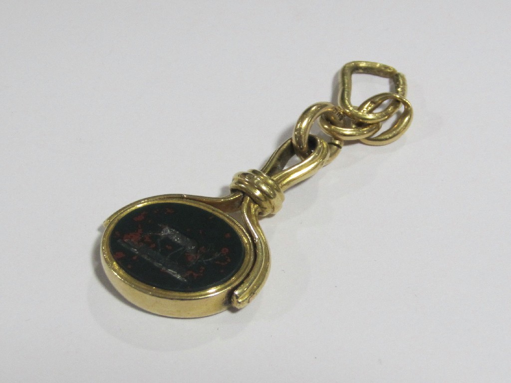 Appraisal: An eighteen carat gold mounted revolving fob seal with a