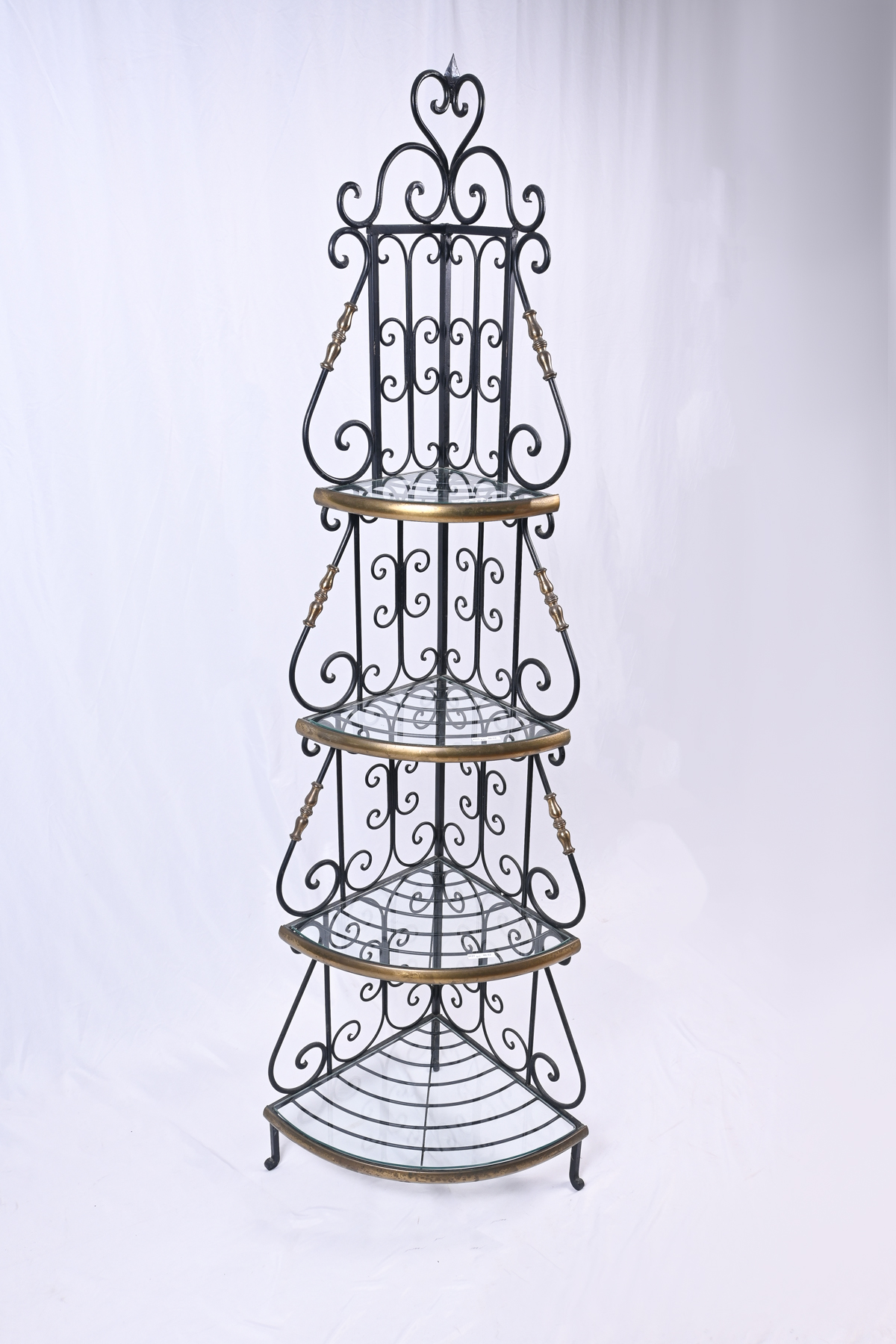 Appraisal: WROUGHT IRON BRASS TIERED CORNER ETAGERE Four tiered graduated wrought