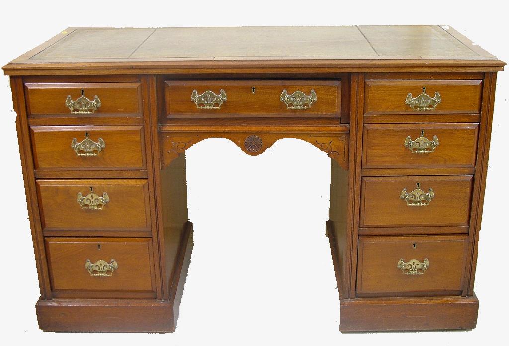 Appraisal: Late th century mahogany kneehole writing desk the rosewood crossbanded