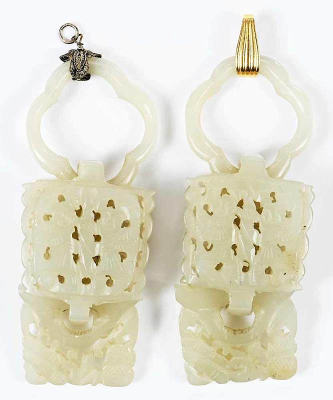 Appraisal: Pair Carved Hardstone Pendants each with different non-gold bail quatrefoil