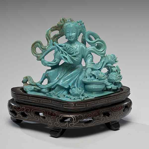 Appraisal: Chinese Carved Turquoise Guanyin China th century A well carved