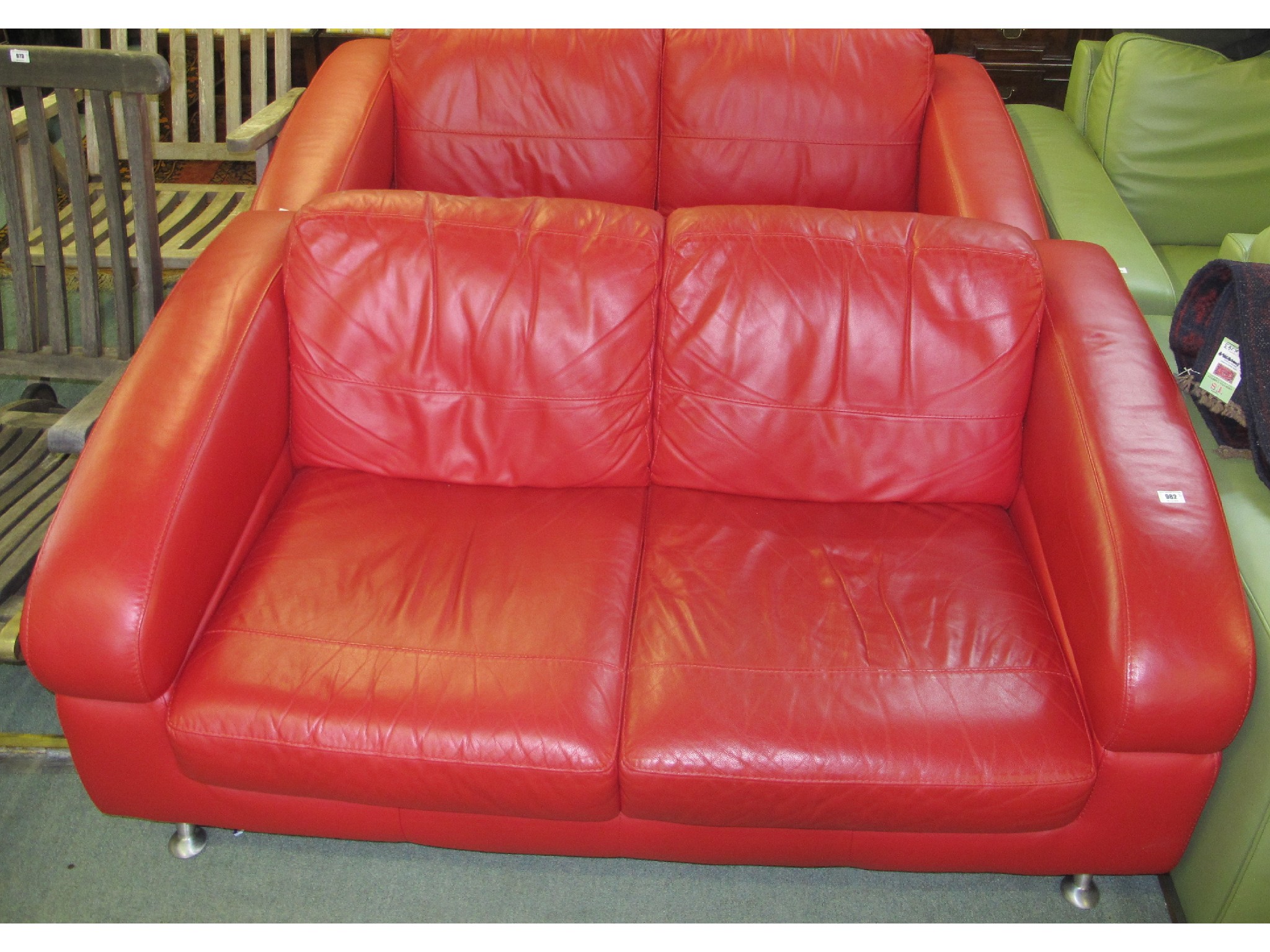 Appraisal: Pair of red leather two seater settees