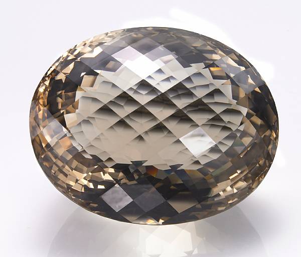 Appraisal: Very Large Smoky Quartz Brazil A cabinet-sized oval faceted stone