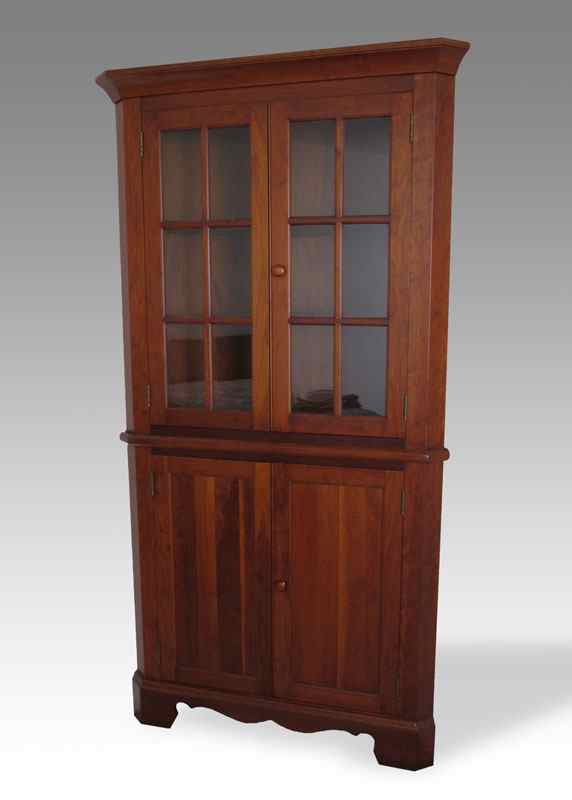 Appraisal: CHERRY CORNER CUPBOARD th century production panel glass top section