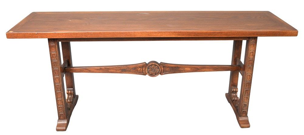 Appraisal: Tressel Oak Hall Table having carved floral designed stretcher height