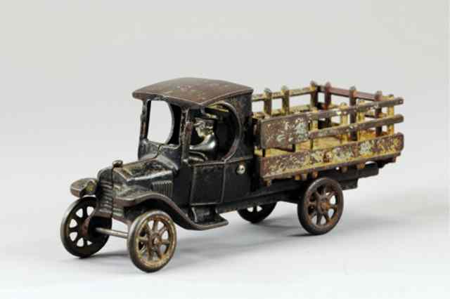 Appraisal: ARCADE MODEL 'T' STAKE TRUCK Cast iron painted in black