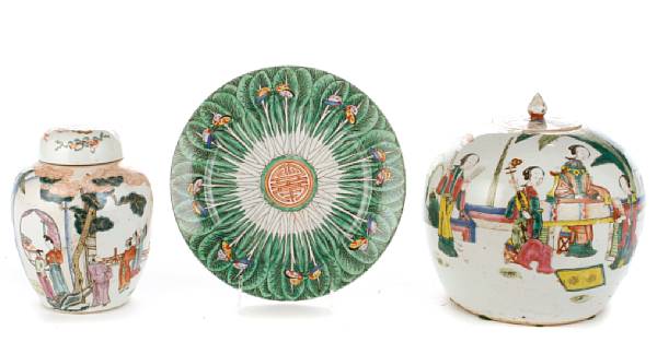 Appraisal: A pair of famille rose enameled covered ovoid jars including