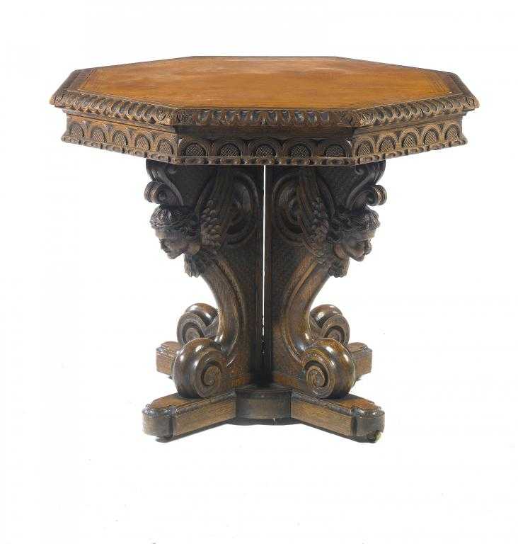 Appraisal: A VICTORIAN OAK OCTAGONAL CENTRE TABLE the leather inlet top