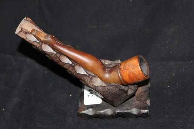 Appraisal: A BAKELITE PIPE in the form of a Ballerina's leg