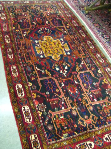 Appraisal: Oriental rug tribal design ' x ' light wear