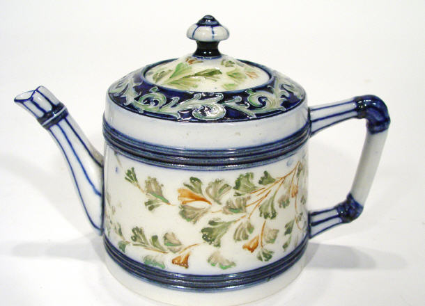 Appraisal: Large Moorcroft McIntyre Florian ware teapot hand painted and tubelined