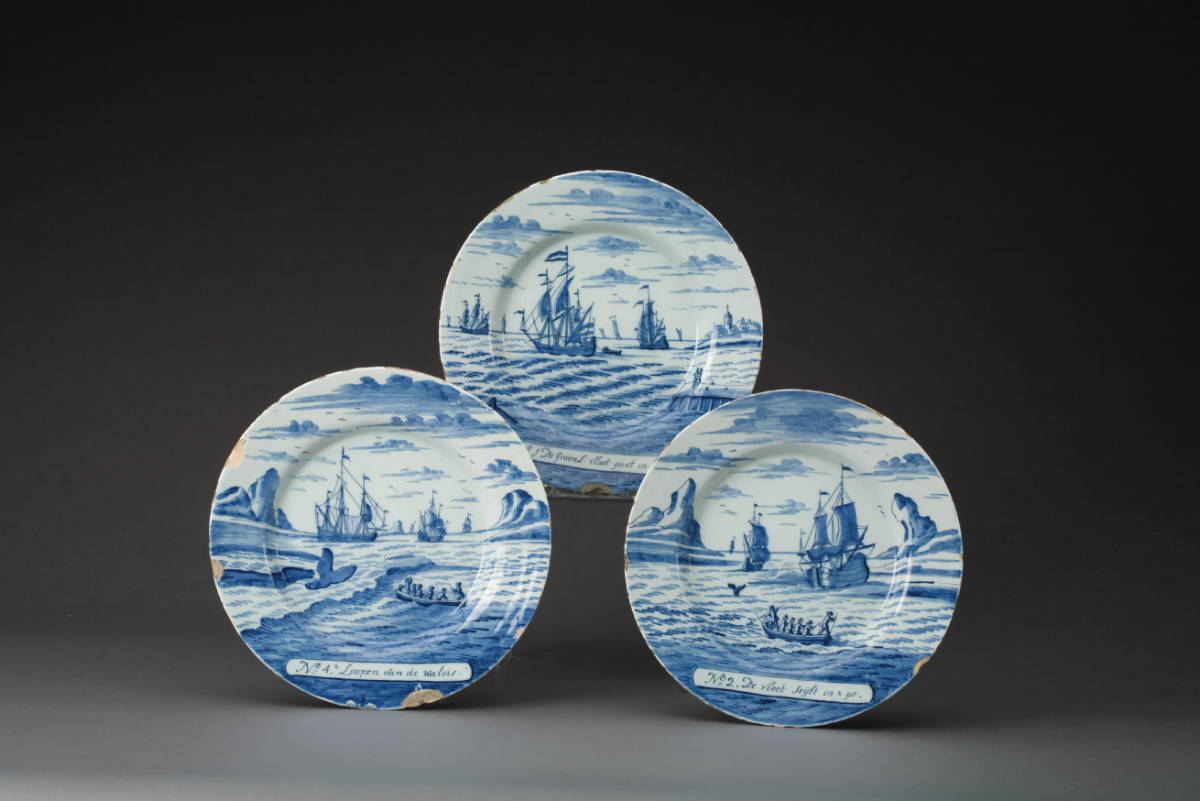 Appraisal: THREE DUTCH DELFT BLUE AND WHITE PLATES FROM THE 'GREENLAND