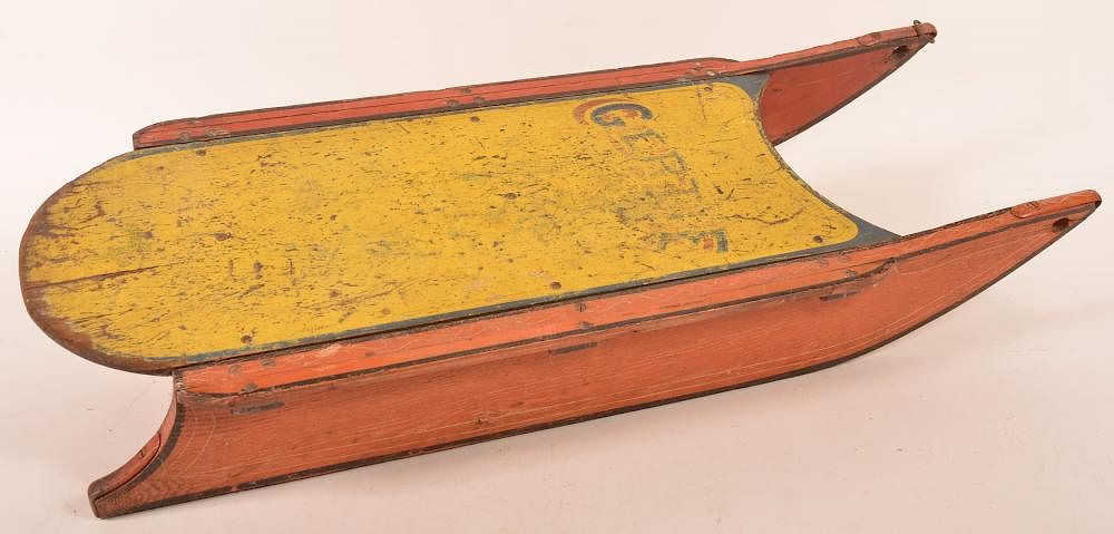 Appraisal: Painted wooden child's sled with iron runners Painted wooden child's