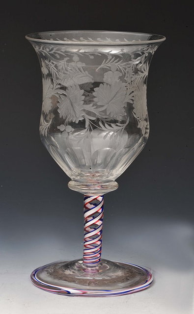 Appraisal: A STOURBRIDGE ENGRAVED LARGE GLASS with coloured twist stem and