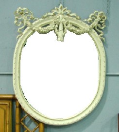 Appraisal: A Louis the XV style oval wall mirror in painted