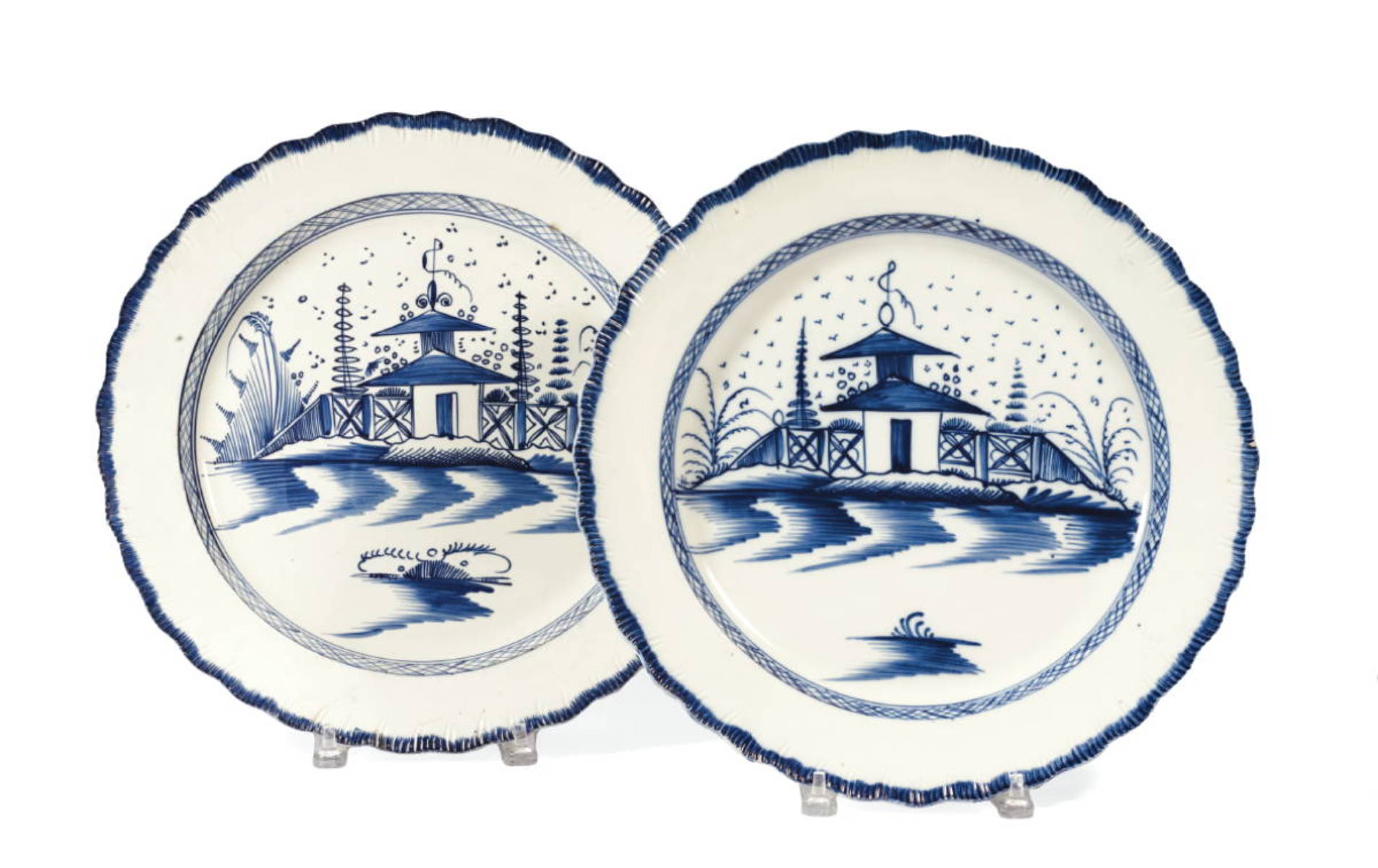 Appraisal: TWO SIMILAR ENGLISH PEARLWARE BLUE AND WHITE SHELL-EDGE DISHES CIRCA