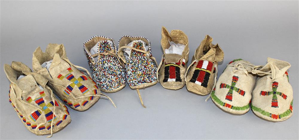 Appraisal: FOUR PAIRS OF NATIVE AMERICAN BEADED HIDE CHILD'S MOCCASINS Southern